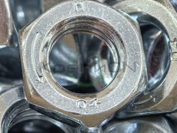 Гайка шестигранная низкая ГОСТ 5916-70 / DIN 439 M12 4.0 гальв. цинк левая резьба (LH) — фото